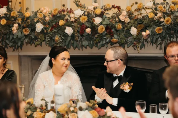 Wedding top table with a floral fireplace garland by Pure Flowers of Distinction, Boyle, Co. Roscommon