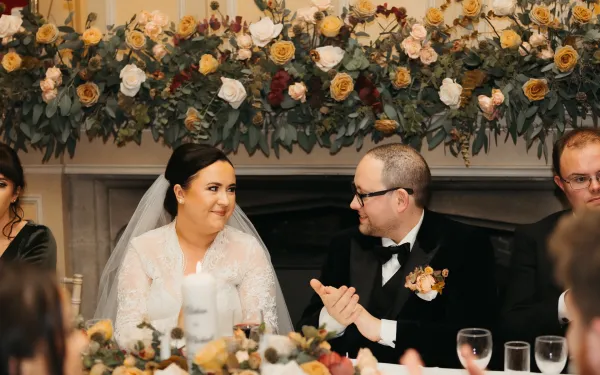 Wedding top table with a floral fireplace garland by Pure Flowers of Distinction, Boyle, Co. Roscommon