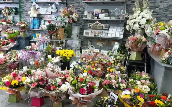 Inside Vivid Floral Design in Wrexham, with hand-tied bouquets and gifts on display